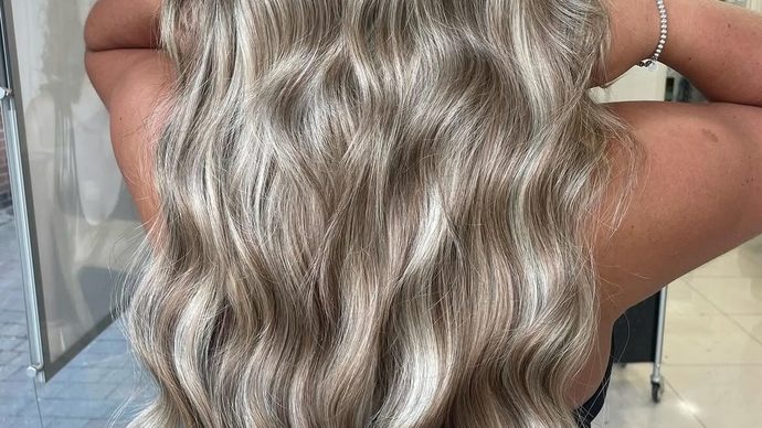 Silver blonde waves, coloured and styled in the salon.